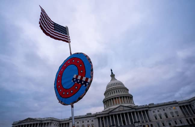 A QAnon sign outside the Capitol. (Alamy)