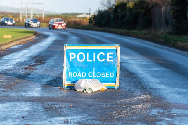 Road closed sign due to Storm Arwen (Alamy)